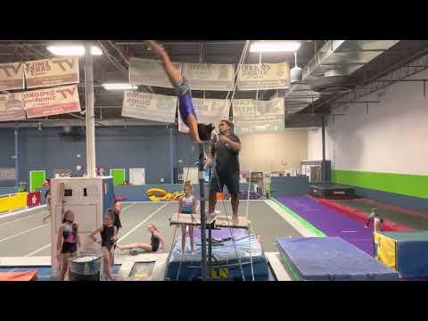 Video of 1 1/2 twisting dismount off bars 