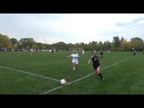 Video of 2 games--Game 1 (Black Jersey #2)--Game 2 (Gray Jersey #2)----yellow cleats---blue pre-wrap in hair