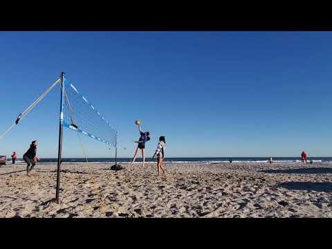 Video of Daphne Hanzak class of 2022, royal blue t-shirt, beach volleyball pick-up game