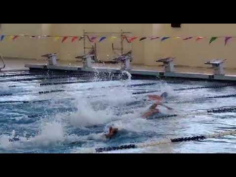 Video of PRHSAA 200 free relay leg 26.90 SCM (Lane 5, grey cap, blue suit)