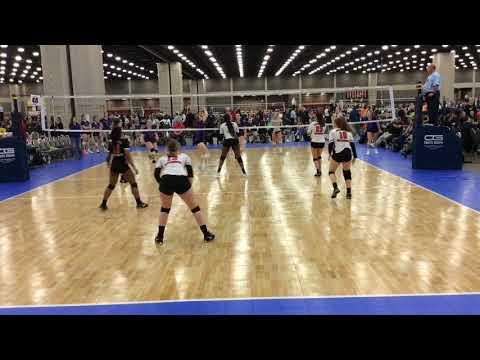 Video of Mia Moore; #11 White and Purple Jersey