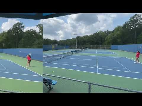 Video of Tennis practice /red shirt , black shorts 