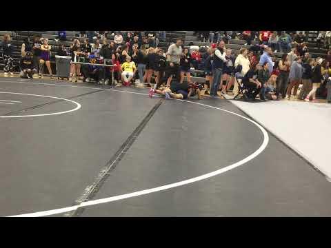 Video of wrestling at the edge of the mat