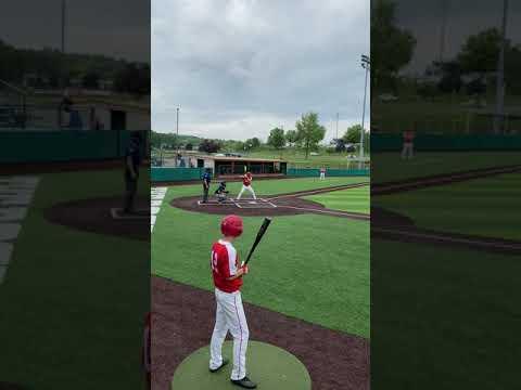 Video of High school playoffs sophomore lead off batter. 