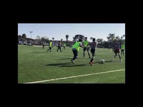 Video of Aidan Kelly beating two defenders on left wing during soccer match