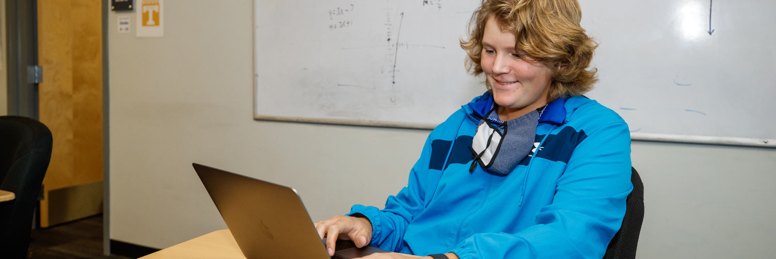 student-athlete on computer